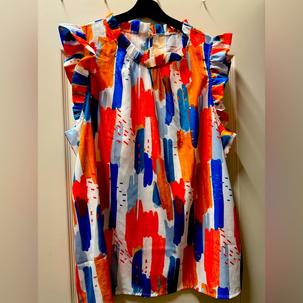Colorful sleeveless top. NWOT